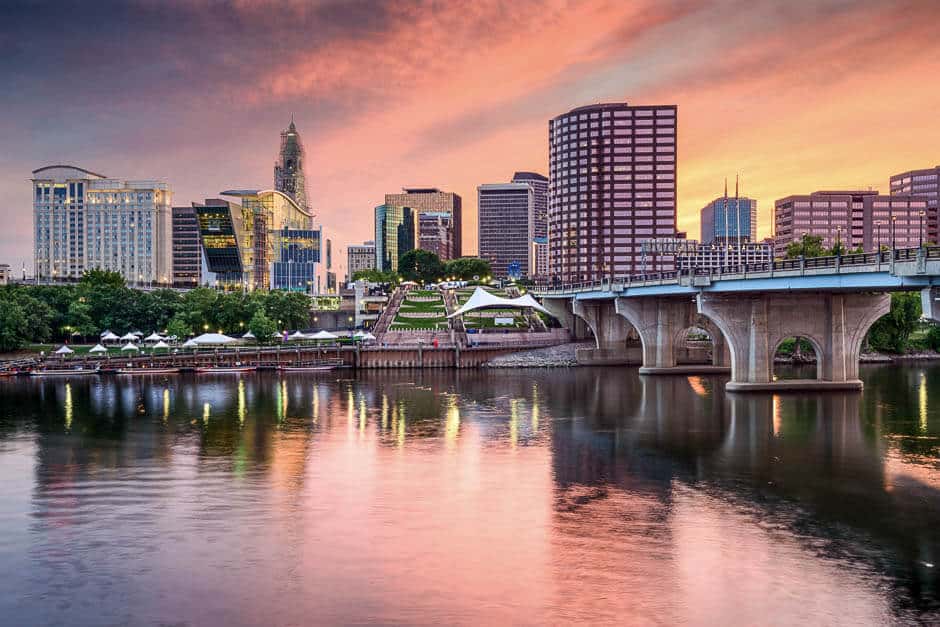 View of downtown Hartford, Connecticut USA at sunset, the starting point for a New England getaway