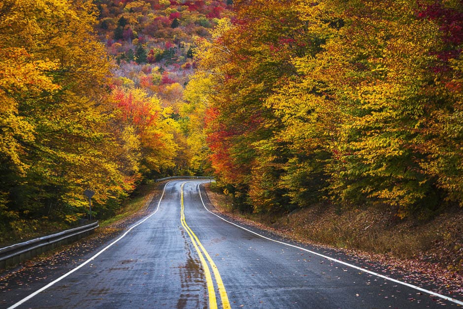 Fall foliage on the Kancamagus Highway in New Hampshire on a New England road trip