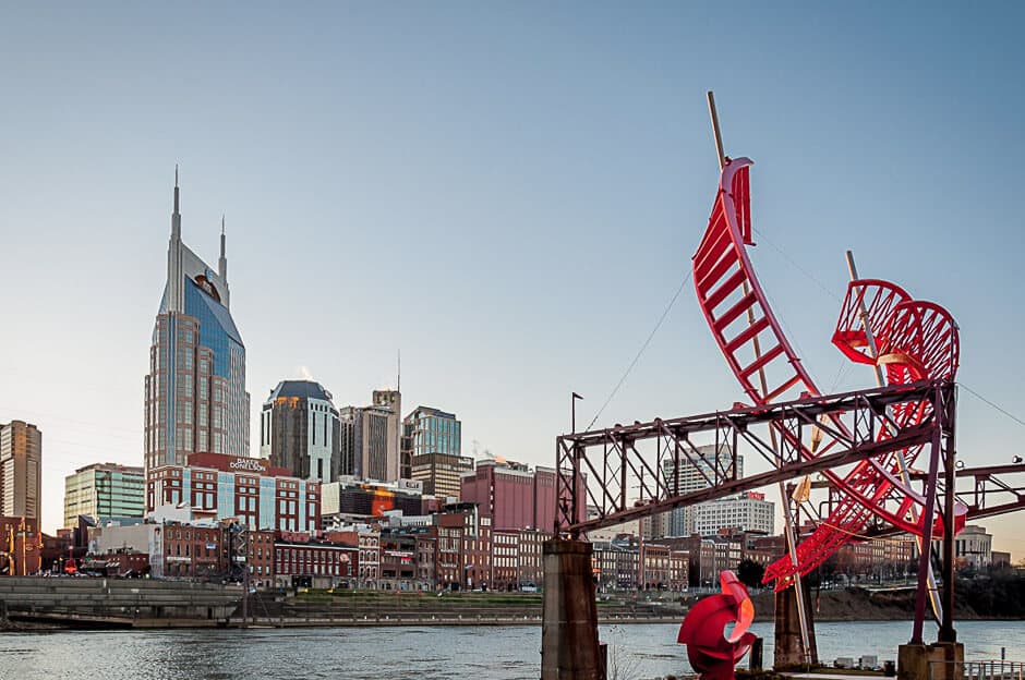 City skyline with river and art struture in the foreground, Nasville bestl vacations in the U.S.