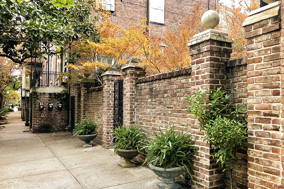 Beautiful fall foliage and old brickwork in the Historic District of Savannah, Georgia