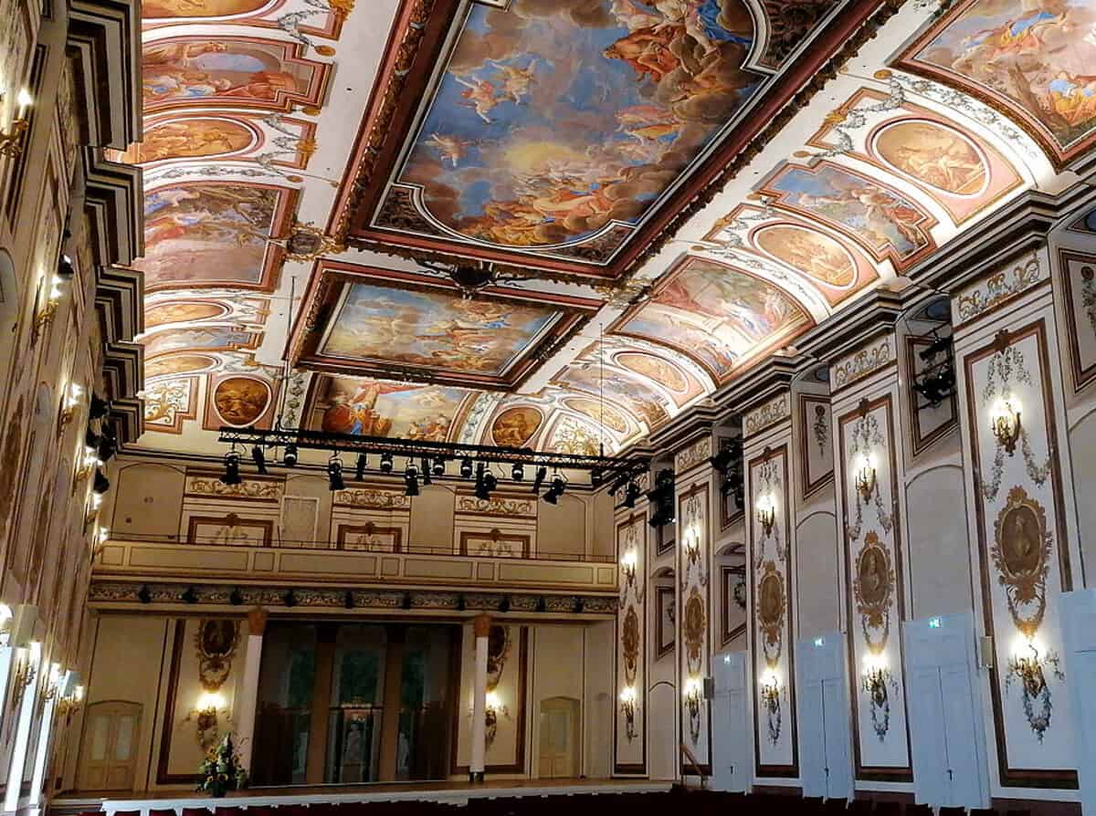 A beautiful concert hall with frescoes on the ceiling in the Esterhazy Palace in Eisenstadt, Austria.